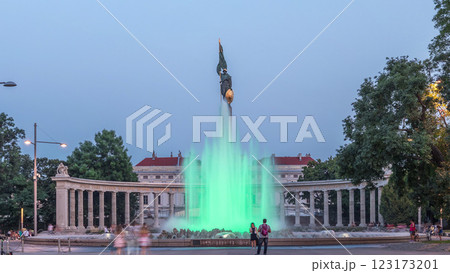 The heroes monument of the red army in schwarzenbergplatz day to night timelapse at night with colorful light fountain in vienna, austria 123173201