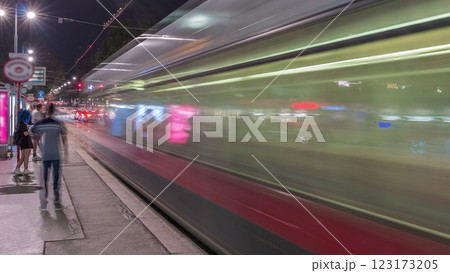 Old tram on a stop with the Vienna Opera House Behind timelapse. Old tram on a stop with the Vienna Opera House Behind timelapse. 123173205