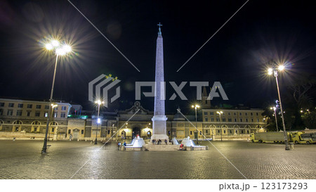 People are gathering under the central column on piazza del popolo during night timelapse hyperlapse 123173293