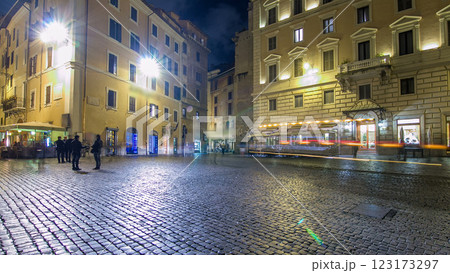 Walk down streets of Rome timelapse hyperlapse from the Pantheon to fountain Trevi showing restaurants and the blur of people at night 123173297