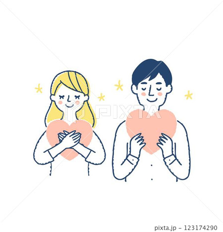 ハートを持っている笑顔の若いカップル 123174290