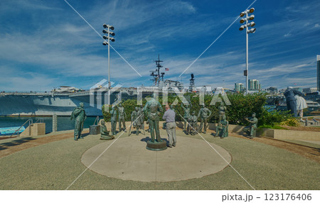 The USS Midway Museum and Unconditional Surrender  Statue (sculpture) in San Diego, California, USA 123176406