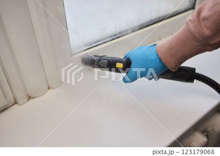 Efficient Steam Cleaning of Windows Utilizing Specialized Professional Equipment and Tools 123179068