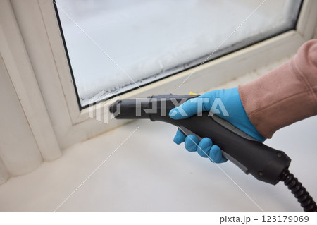 Efficient Steam Cleaning of Windows Utilizing Specialized Professional Equipment and Tools Efficient Steam Cleaning of Windows Utilizing Specialized Professional Equipment and Tools 123179069