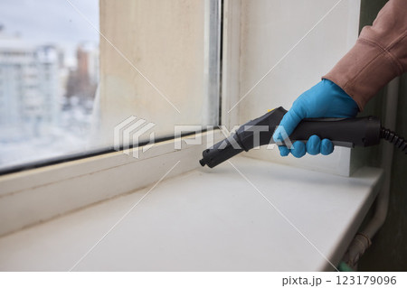 Efficient Steam Cleaning of Windows Utilizing Specialized Professional Equipment and Tools Efficient Steam Cleaning of Windows Utilizing Specialized Professional Equipment and Tools 123179096