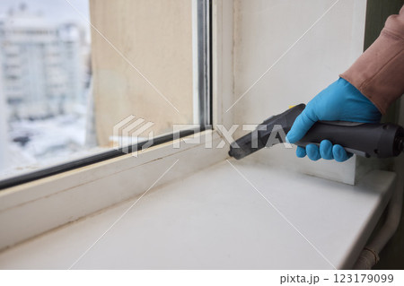 Efficient Steam Cleaning of Windows Utilizing Specialized Professional Equipment and Tools 123179099