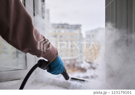 Efficient Steam Cleaning of Windows Utilizing Specialized Professional Equipment and Tools Efficient Steam Cleaning of Windows Utilizing Specialized Professional Equipment and Tools 123179101