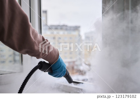 Efficient Steam Cleaning of Windows Utilizing Specialized Professional Equipment and Tools Efficient Steam Cleaning of Windows Utilizing Specialized Professional Equipment and Tools 123179102
