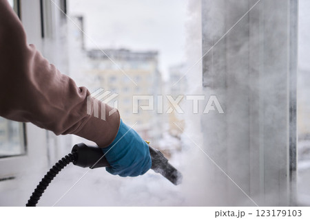 Efficient Steam Cleaning of Windows Utilizing Specialized Professional Equipment and Tools 123179103