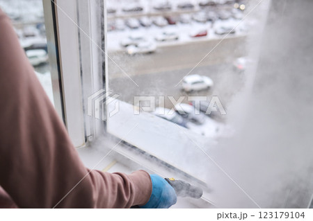 Efficient Steam Cleaning of Windows Utilizing Specialized Professional Equipment and Tools 123179104
