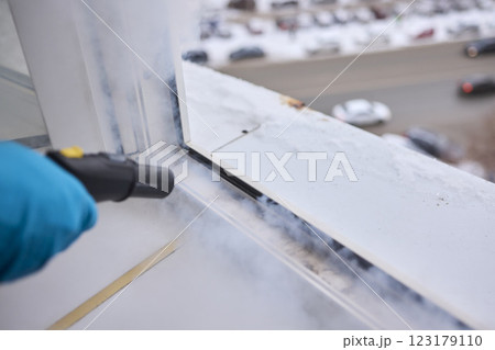 Efficient Steam Cleaning of Windows Utilizing Specialized Professional Equipment and Tools 123179110