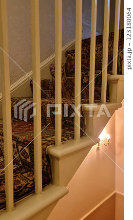 Cozy vintage white stairs in small house 123180064
