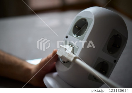 Introducing a modern power strip with multiple outlets for efficient charging and convenience Introducing a modern power strip with multiple outlets for efficient charging and convenience 123180634