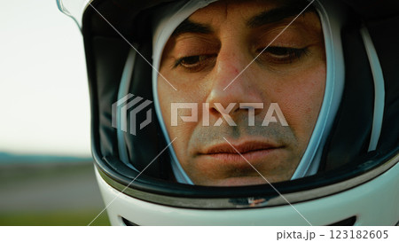 Astronaut With Helmet Pensive On The Continuation Of The Space Mission 123182605