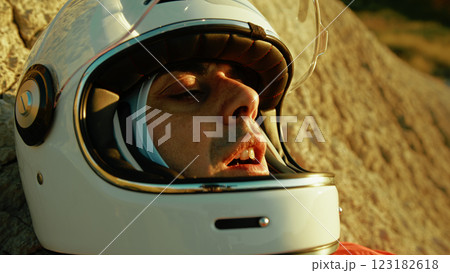 Astronaut Resting On A Rock Suffering From Lack Of Supplies To Live Astronaut Resting On A Rock Suffering From Lack Of Supplies To Live 123182618