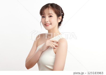 Beautiful young asian woman with clean fresh skin on white background, Face care, Facial treatment, Cosmetology, beauty and spa, Asian women portrait. Beautiful young asian woman with clean fresh skin on white background, Face care, Facial treatment, Cosmetology, beauty and spa, Asian women portrait. 123183963