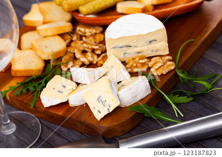 Blue cheese served with croutons and walnuts Blue cheese served with croutons and walnuts 123187823