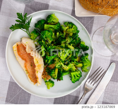 Appetising roasted rockfish fillet with seared broccoli Appetising roasted rockfish fillet with seared broccoli 123187869