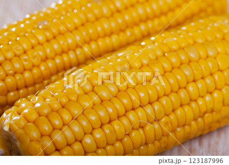 Delicious sweet boiled corn cobs on plate.  123187996
