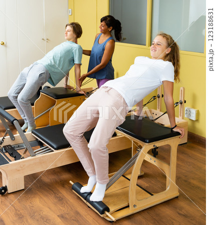 Portrait of girl at physiotherapy clinic - revitalizing gym exercises Portrait of girl at physiotherapy clinic - revitalizing gym exercises 123188631