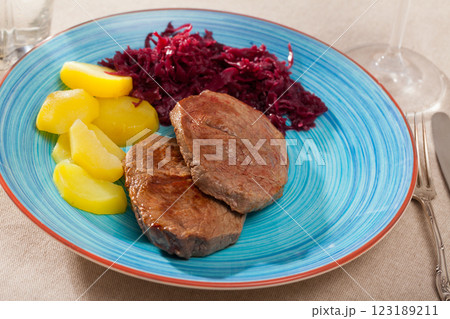 Veal steak with potato and sauerkraut 123189211