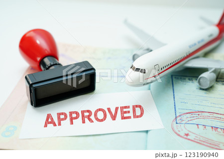 Passport with approved stamp on document for tourism to immigration at airport in country. Passport with approved stamp on document for tourism to immigration at airport in country. 123190940