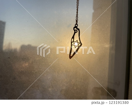 Symbol silhouetted against a winter sunrise Symbol silhouetted against a winter sunrise 123191380