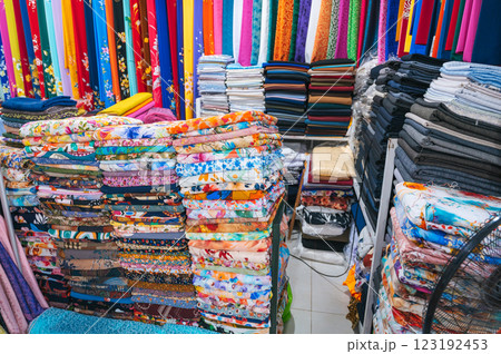 clothing and fabrics at textile market bazaar in Asia 123192453