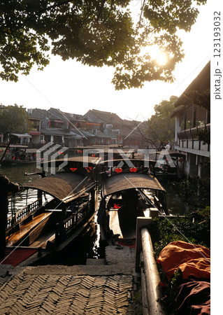 Tourist boats on the water canals of Xitang Town in Zhejiang Province, China 123193032