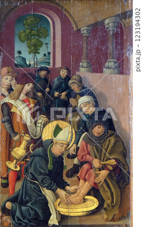 Louis is washing the feet of lepers and pilgrims, altar of St. Louis of Toulouse in St James Church in Rothenburg ob der Tauber, Germany Louis is washing the feet of lepers and pilgrims, altar of St. Louis of Toulouse in St James Church in Rothenburg ob der Tauber, Germany 123194302