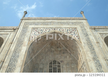 Taj Mahal (Crown of Palaces), an ivory-white marble mausoleum in Agra, Uttar Pradesh, India Taj Mahal (Crown of Palaces), an ivory-white marble mausoleum in Agra, Uttar Pradesh, India 123194311