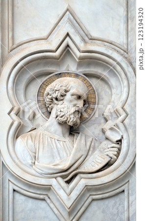 Saint, relief on the facade of Basilica of Santa Croce (Basilica of the Holy Cross) - famous Franciscan church in Florence, Italy 123194320