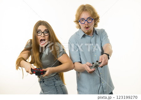 Gaming couple playing games Gaming couple playing games 123199270