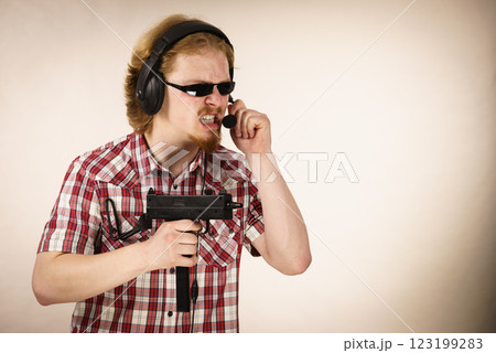 Gamer man shooting from gun Gamer man shooting from gun 123199283