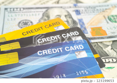 Credit card on US dollar banknotes, finance economy trading shopping online business. Credit card on US dollar banknotes, finance economy trading shopping online business. 123199653