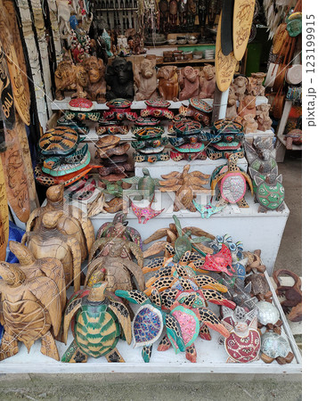 Bunch of handmade wood crafted souvenirs figurines of Balinese traditional style Bunch of handmade wood crafted souvenirs figurines of Balinese traditional style 123199915
