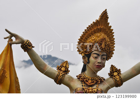 A colorful statue beautifully showcasing traditional dance attire in Ulun Danu Beratan Temple 123199980