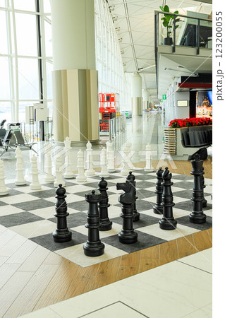 Big chess board service for passengers in modern international Airport. 123200055