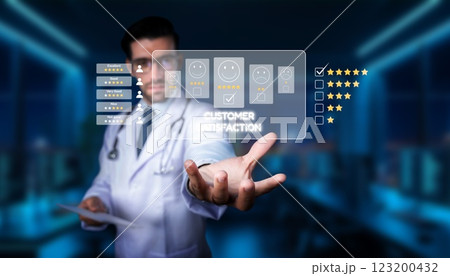 Medical professional analyzing customer satisfaction feedback with digital interface in modern healthcare setting to improve patient experiences and quality of care. PHMT 123200432