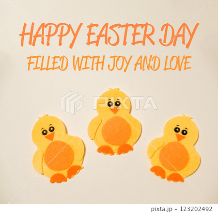 Three yellow chicks are sitting on a white background Three yellow chicks are sitting on a white background 123202492