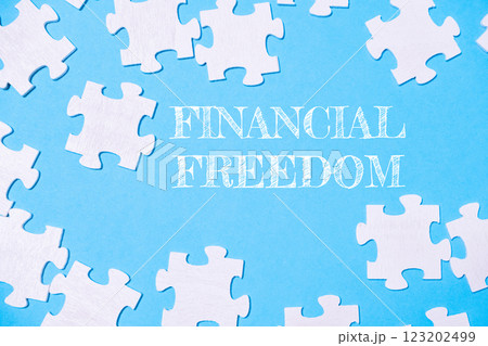 The puzzle pieces are scattered all over the image, creating a sense of chaos The puzzle pieces are scattered all over the image, creating a sense of chaos 123202499