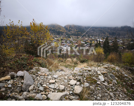 Rocky hiking trail overlooking chamonix town in autumn 123204876