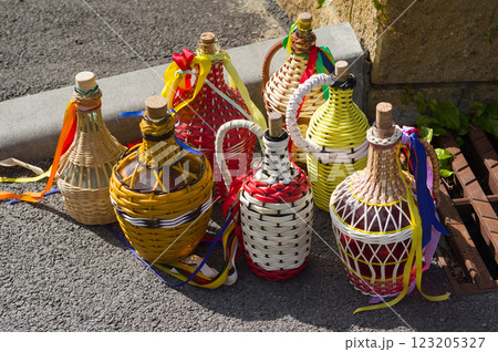 Decorated demijohns. Traditional vessels for wine and other drinks that are also used at folk festivals. South Moravia, Czech Republic. 123205327