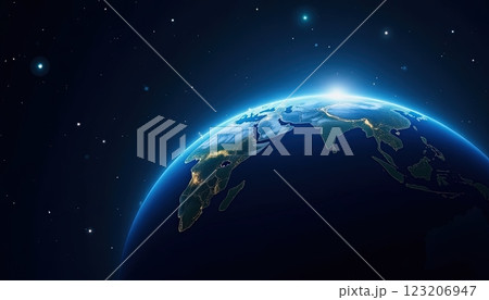 View of Earth illuminated by sunlight from space showcasing continents and oceans against a starry background 123206947