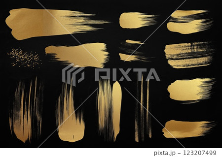 Set of gold paint brush strokes isolated on black background. Golden grunge texture. 123207499