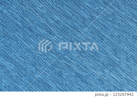 Closeup, macro of blue fabric texture background. Satin diagonal weaving cloth structure, canvas Closeup, macro of blue fabric texture background. Satin diagonal weaving cloth structure, canvas 123207942