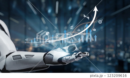 Futuristic robotic hand showcasing digital graphs and growth arrows in a modern office setting emphasizing technology and innovation in business analytics. Auvana Futuristic robotic hand showcasing digital graphs and growth arrows in a modern office setting emphasizing technology and innovation in business analytics. Auvana 123209616
