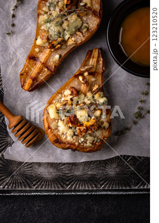 Baked pears with blue cheese and honey 123210520