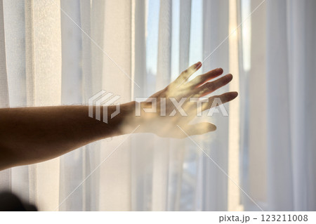 Reaching for the Beautiful Light That Filters Through Delicate Sheer Curtains, Embracing Peace 123211008