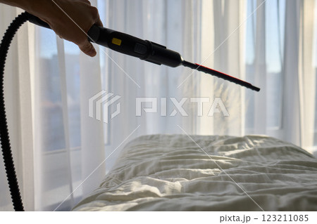 Steam Cleaning in Progress We Are Freshening Up Your Bedding for a Cozy Experience 123211085
